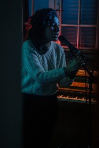girl singing in a karaoke bar